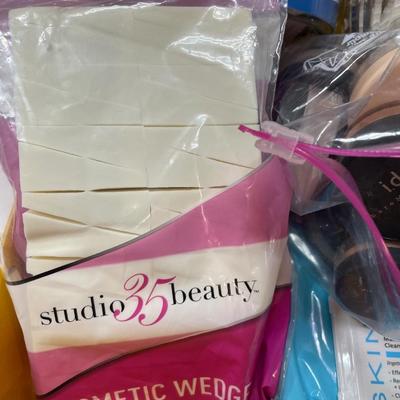Cosmetic Sponges, Jar of cotton balls, Makeup Brushes