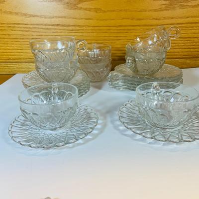 LOT 63: Large Assortment of Clear Glass Serving Pieces Some Etched Fruit