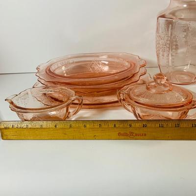 LOT 70: Large Collection of Pink Depression Glass Serving Pieces and More Including Bowls, Platters, Divided Dish, Salt Shakers, Sugar...