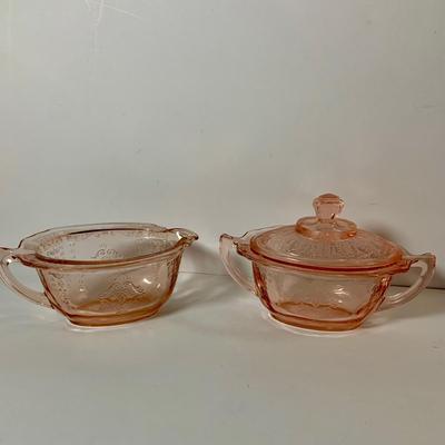 LOT 70: Large Collection of Pink Depression Glass Serving Pieces and More Including Bowls, Platters, Divided Dish, Salt Shakers, Sugar...