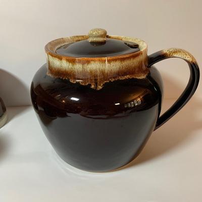 LOT 77: Collection of Brown Drip Glaze Pottery Including Pfaltzgraff Bean Pot and Serving Platter, Cups, Bowls and Platter by Various Makers