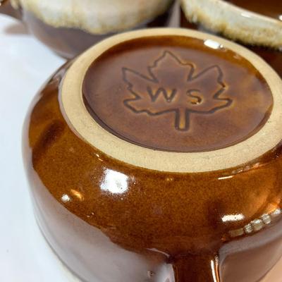 LOT 77: Collection of Brown Drip Glaze Pottery Including Pfaltzgraff Bean Pot and Serving Platter, Cups, Bowls and Platter by Various Makers