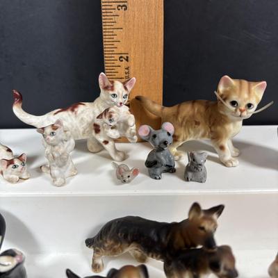 LOT 109: Wonderful World of Miniatures: Smokey the Bear, Owls, Cats. Skunk, Dogs and More