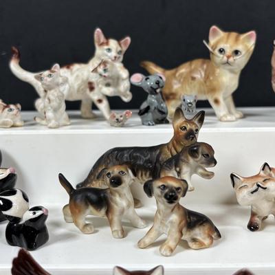 LOT 109: Wonderful World of Miniatures: Smokey the Bear, Owls, Cats. Skunk, Dogs and More