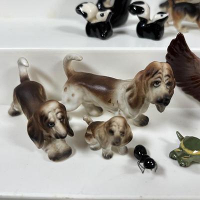 LOT 109: Wonderful World of Miniatures: Smokey the Bear, Owls, Cats. Skunk, Dogs and More