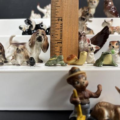 LOT 109: Wonderful World of Miniatures: Smokey the Bear, Owls, Cats. Skunk, Dogs and More