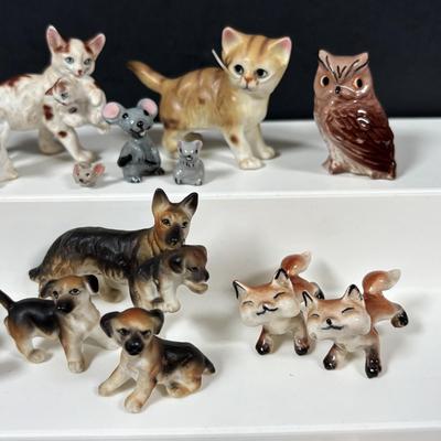 LOT 109: Wonderful World of Miniatures: Smokey the Bear, Owls, Cats. Skunk, Dogs and More