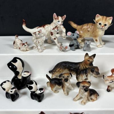 LOT 109: Wonderful World of Miniatures: Smokey the Bear, Owls, Cats. Skunk, Dogs and More