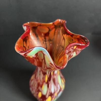 LOT 115: Beautiful Glass Collection: Amber/Gold Handblown Pitcher, Multi Color Art Glass Vase (orange, red, blue) and Cranberry Pitcher