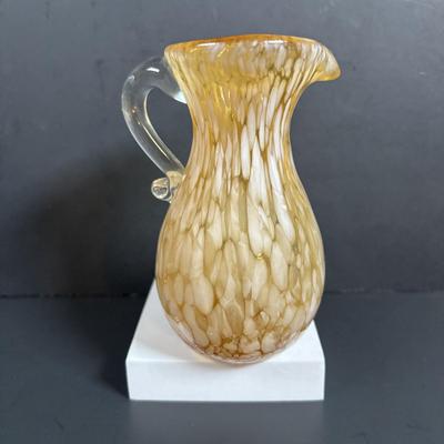 LOT 115: Beautiful Glass Collection: Amber/Gold Handblown Pitcher, Multi Color Art Glass Vase (orange, red, blue) and Cranberry Pitcher