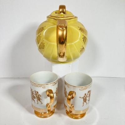 LOT 137: Collection of Hand Painted Tea Pots and Cups - Hall, Royal Crown and More