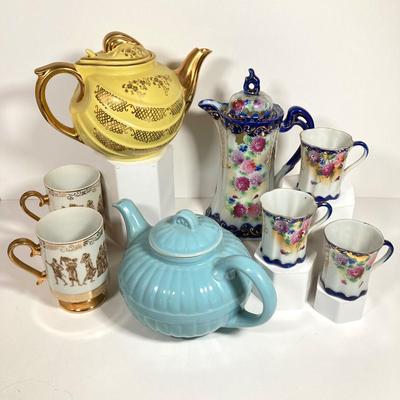 LOT 137: Collection of Hand Painted Tea Pots and Cups - Hall, Royal Crown and More