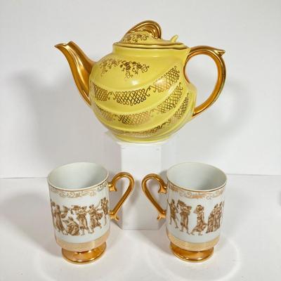 LOT 137: Collection of Hand Painted Tea Pots and Cups - Hall, Royal Crown and More