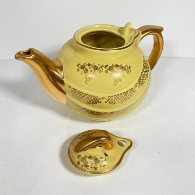LOT 137: Collection of Hand Painted Tea Pots and Cups - Hall, Royal Crown and More