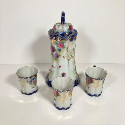 LOT 137: Collection of Hand Painted Tea Pots and Cups - Hall, Royal Crown and More