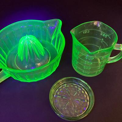 LOT 138: Uranium Glass Collection - Juicer, Measuring Cup and Coaster