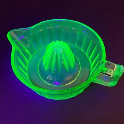 LOT 138: Uranium Glass Collection - Juicer, Measuring Cup and Coaster