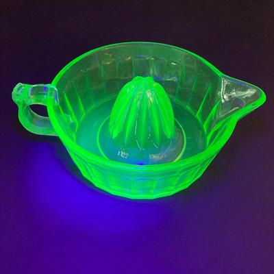 LOT 138: Uranium Glass Collection - Juicer, Measuring Cup and Coaster