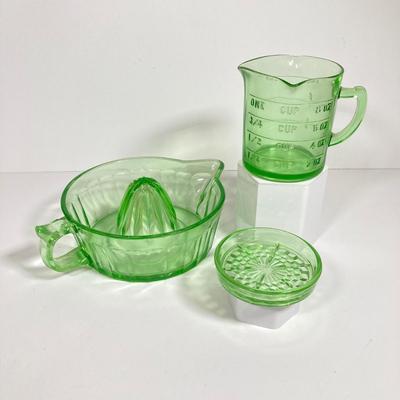 LOT 138: Uranium Glass Collection - Juicer, Measuring Cup and Coaster