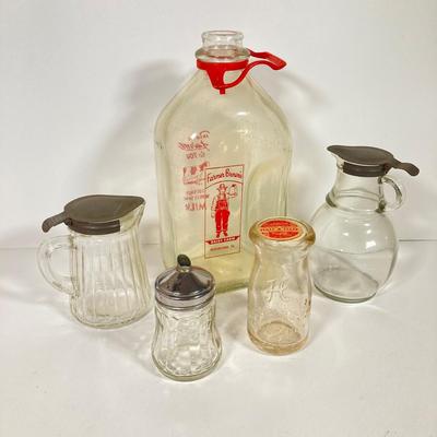 LOT 148: Vintage Farmhouse Decorative Collection - Farmer Brown's / Highland Dairy Bottles, Smucker's Juice / Water Jar, Tins...