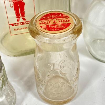 LOT 148: Vintage Farmhouse Decorative Collection - Farmer Brown's / Highland Dairy Bottles, Smucker's Juice / Water Jar, Tins...