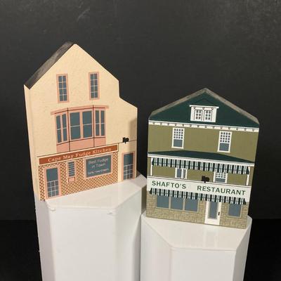 LOT 154: Collection of Cat's Meow Village Replicas Featuring Ocean City, Cape May, Lighthouses, Trinket Box, "The Banning Wharf...