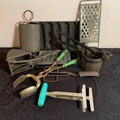 LOT 165: Vintage Kitchen Gadgets Featuring Wagner Kristy Korn Kobs Junior Cornbread Molds, Graters, Strainers and More