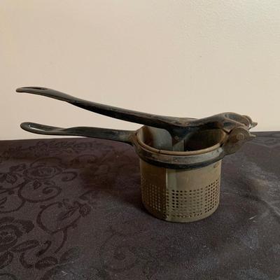 LOT 165: Vintage Kitchen Gadgets Featuring Wagner Kristy Korn Kobs Junior Cornbread Molds, Graters, Strainers and More