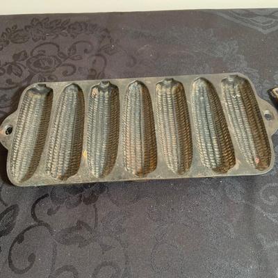 LOT 165: Vintage Kitchen Gadgets Featuring Wagner Kristy Korn Kobs Junior Cornbread Molds, Graters, Strainers and More