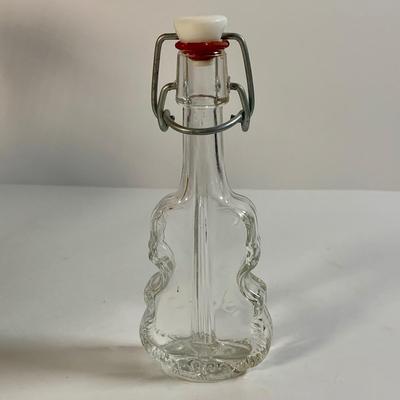 LOT 176: Collection of Violin Shaped Glass Bottles
