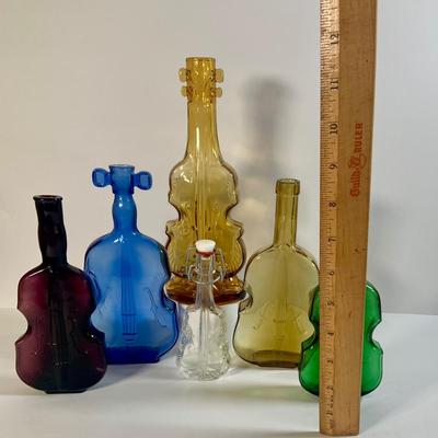 LOT 176: Collection of Violin Shaped Glass Bottles