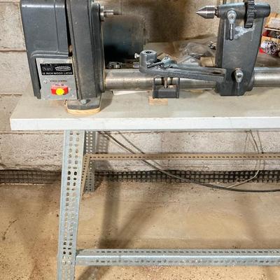 LOT 218: Sears Craftsman 12 Inch Wood Lathe, Central Machinery Copy Lathe Attachment P-37945, Work Bench, Wood Crafting Tools,...