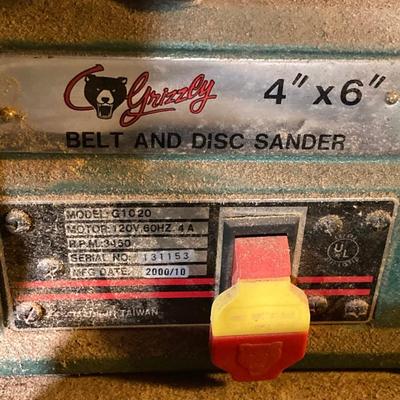 LOT 219: Grizzly Belt and Disc Sander Model G1020 with Work Bench