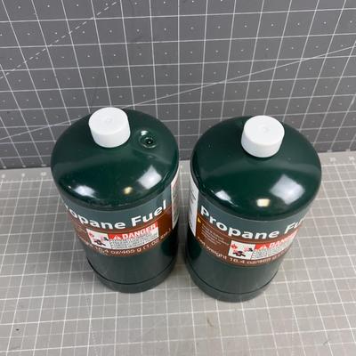 Sale Photo Thumbnail #1104: One is full and the other has a little bit out of it.  No Shipping. 