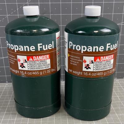 Sale Photo Thumbnail #1103: One is full and the other has a little bit out of it.  No Shipping. 