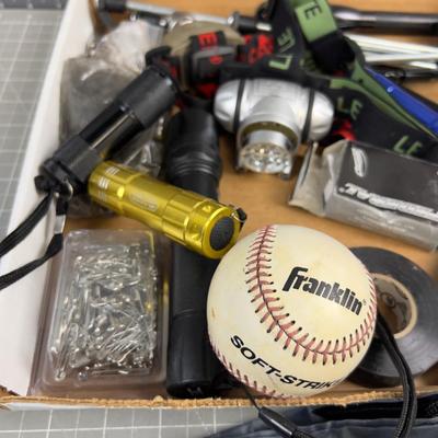 Sale Photo Thumbnail #1302: Flash Light, Sling Shot, Lighter etc. Usable stuff. 