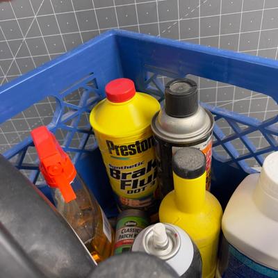 Tub of Garage FLUIDS: Brake Fluid, Liquid Sand Paper, etc.