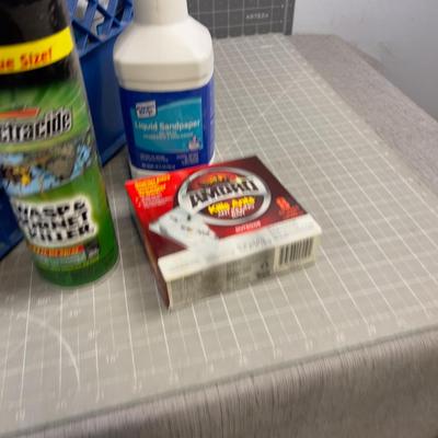 Tub of Garage FLUIDS: Brake Fluid, Liquid Sand Paper, etc.