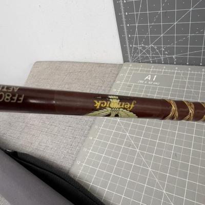 Sale Photo Thumbnail #1619: Used. Old Fenwick. The Lucky fishing pole. Case has been repaired. 