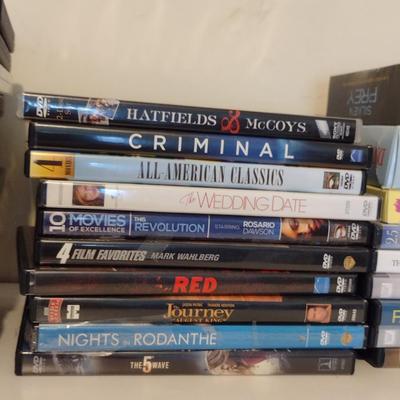 Collection of DVDs and Books on CD
