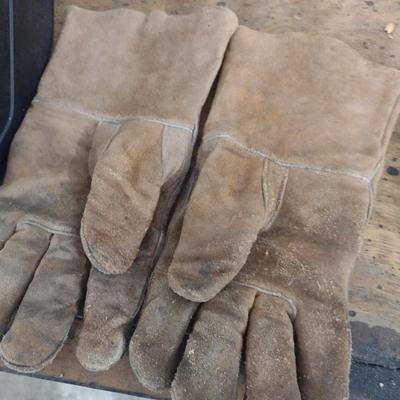 Pair of Welding Helmets and Gloves for Hot Work