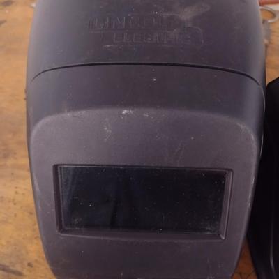 Pair of Welding Helmets and Gloves for Hot Work