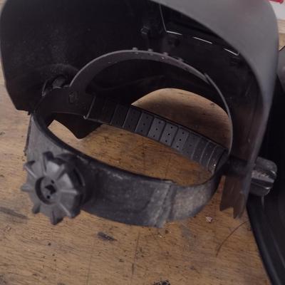 Pair of Welding Helmets and Gloves for Hot Work