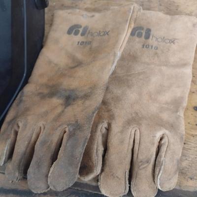 Pair of Welding Helmets and Gloves for Hot Work