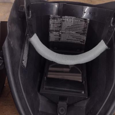 Pair of Welding Helmets and Gloves for Hot Work