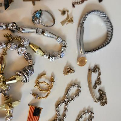 Sale Photo Thumbnail #201: This auction lot is for a Bag of Costume Jewelry.  This is a real mix of items found in a dresser drawer.  There are necklaces, earrings, pins, rings and other miscellaneous items - please see pictures.  Grab this deal quick.