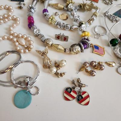 Sale Photo Thumbnail #204: This auction lot is for a Bag of Costume Jewelry.  This is a real mix of items found in a dresser drawer.  There are necklaces, earrings, pins, rings and other miscellaneous items - please see pictures.  Grab this deal quick.