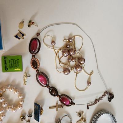 Sale Photo Thumbnail #200: This auction lot is for a Bag of Costume Jewelry.  This is a real mix of items found in a dresser drawer.  There are necklaces, earrings, pins, rings and other miscellaneous items - please see pictures.  Grab this deal quick.