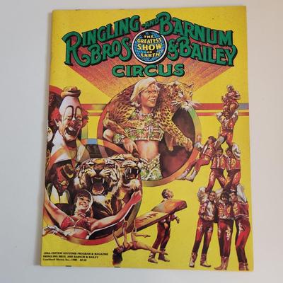 Sale Photo Thumbnail #271: This auction lot is for a 1980 Ringling and Barnum and Baily Circus Program with Poster.  This fun circus souvenir is chocked full of photos and stories of the Greatest Show on Earth. This booklet holds a very framable copy of a poster of wild animal tame