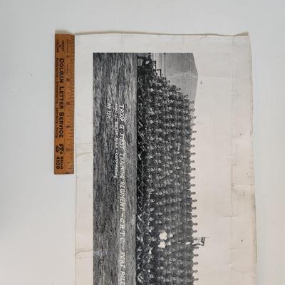 Sale Photo Thumbnail #279: This auction lot is for two WW2 Training Regiment Photographs.  This are both identical and show Troop G, First Training Regiment - CRTC - Fort Riley, KS dated May 1944.  One of photos is rolled and the other is flat.  The flat photo has cracking damaged 
